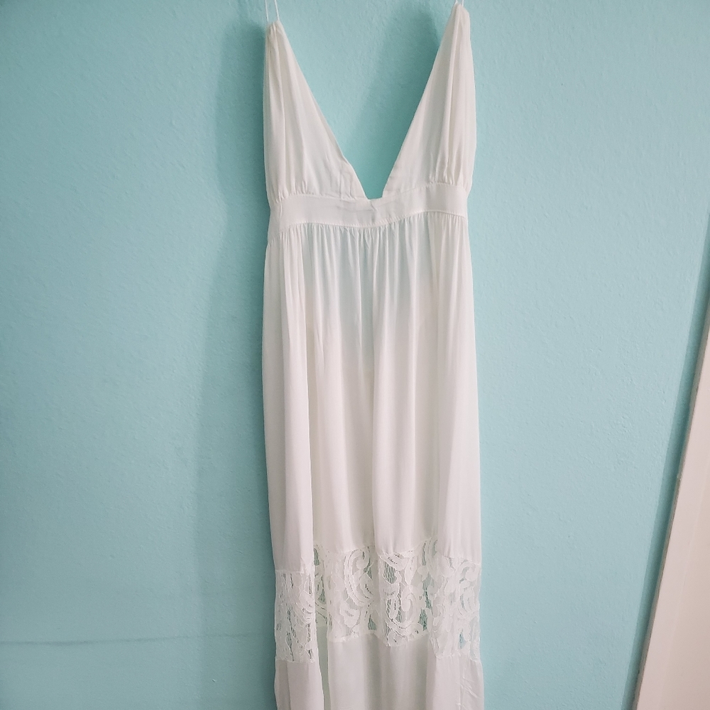 Long, white cotton backless dress